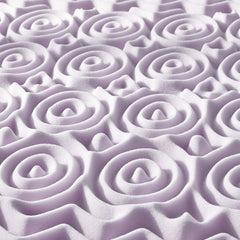 Mellow surmatelas posé dans un dortoir illustrant confort amélioré et gain d'espace