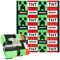 Minecraft plaid face avant montrant motifs Creeper et TNT pour décoration ludique