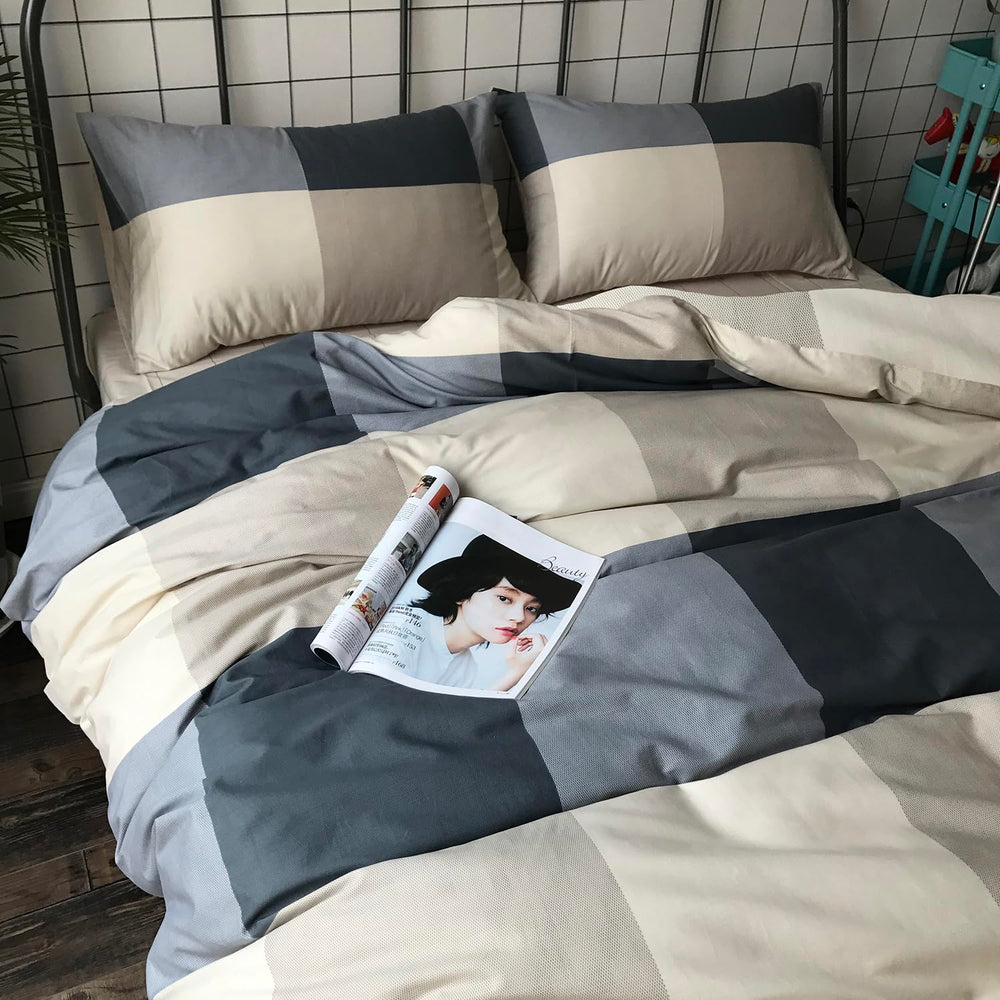 mixinni couette posée sur lit crée ambiance contemporaine accueillante