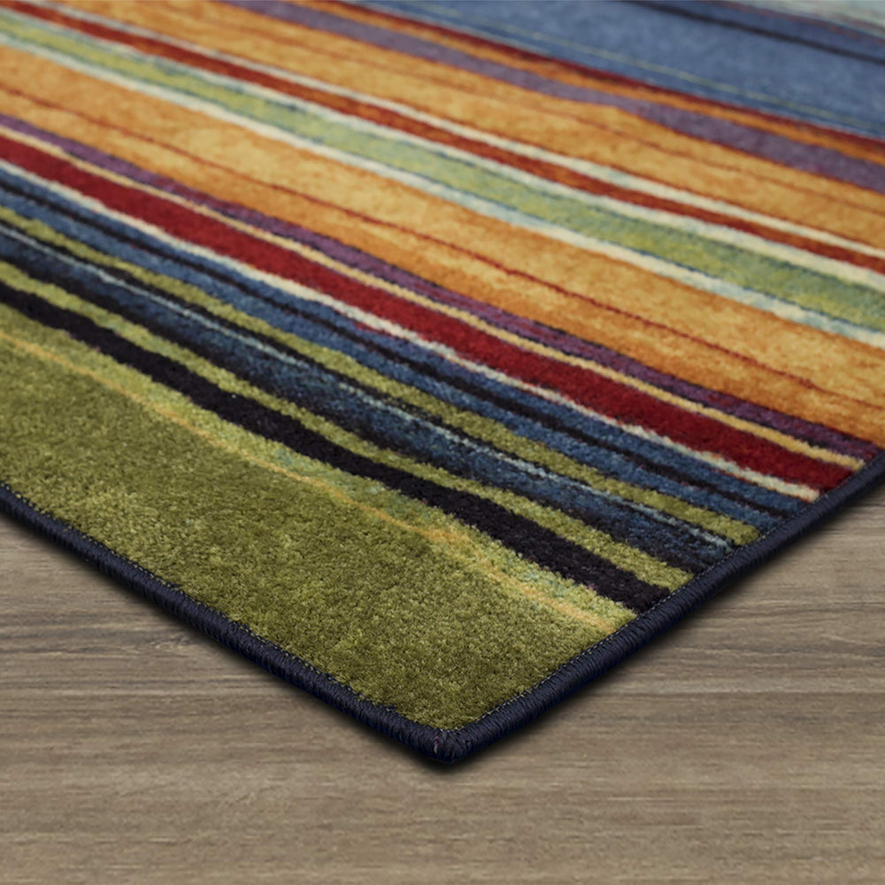 Mohawk Home tapis glissé sous meuble montrant profil bas sûr
