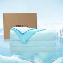 Momcozy couette face avant montrant design et couleur bleu pâle, confort rafraîchissant