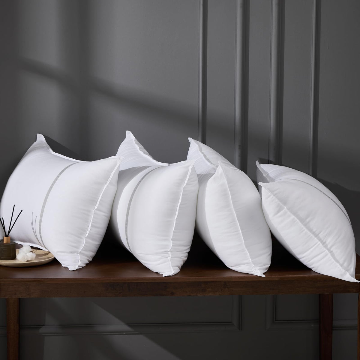 MUFEW avant du paquet montrant le lot de 4 oreillers, présentation soignée et qualité