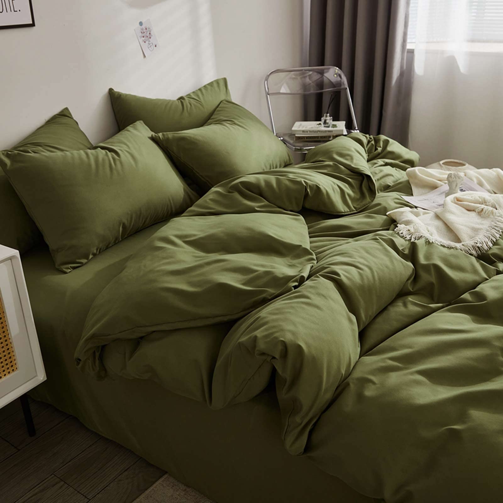 Nanko couette face avant vert olive montrant un lit élégant et accueillant