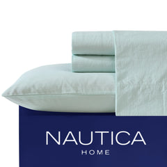 Nautica drap housse élastique montrant maintien sûr et ajustement