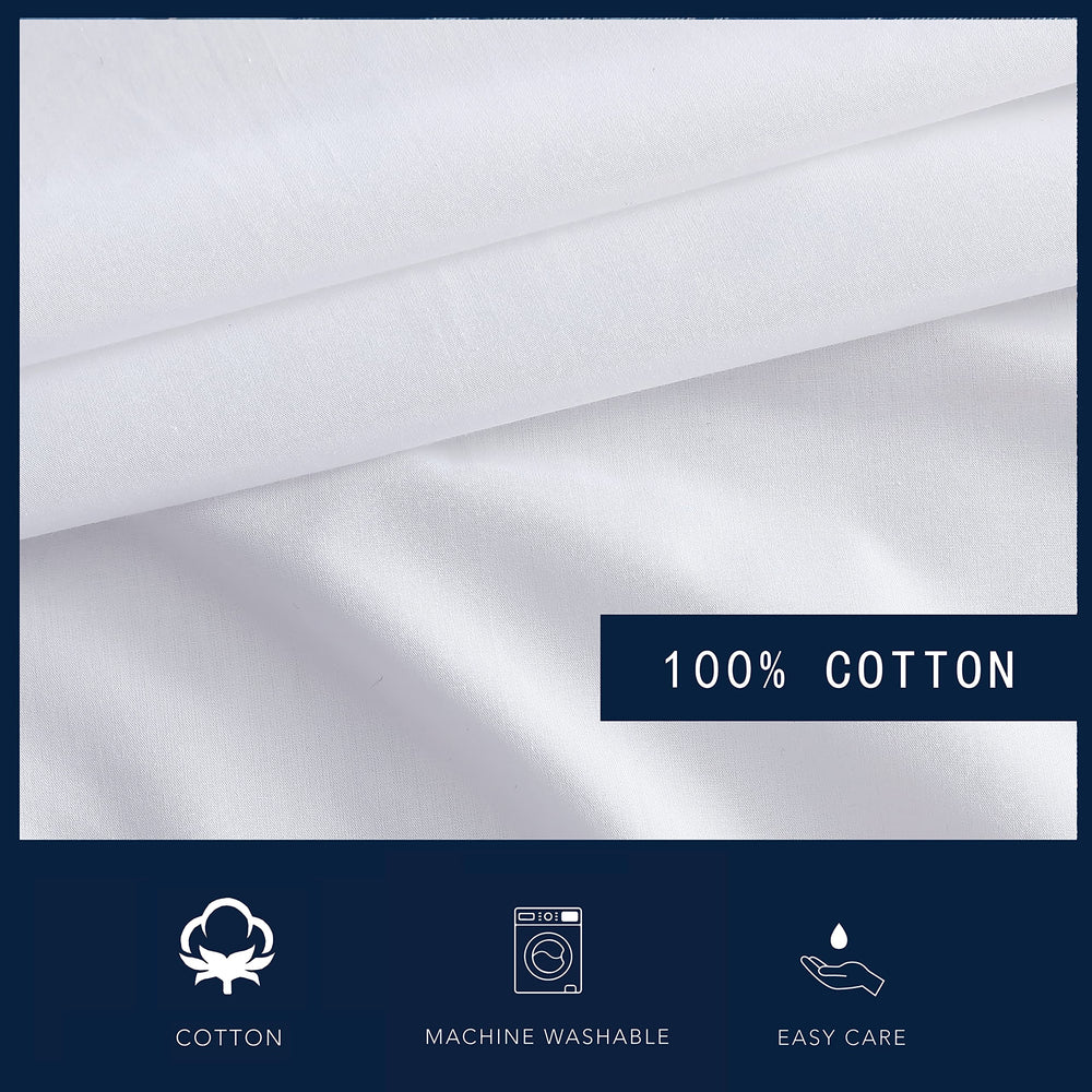 Nautica drap plat et taie mis en scène sur lit, esthétique blanche et soignée