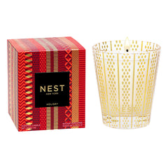 NEST New York emballage avant festif montrant la bougie et son motif doré, parfait pour offrir