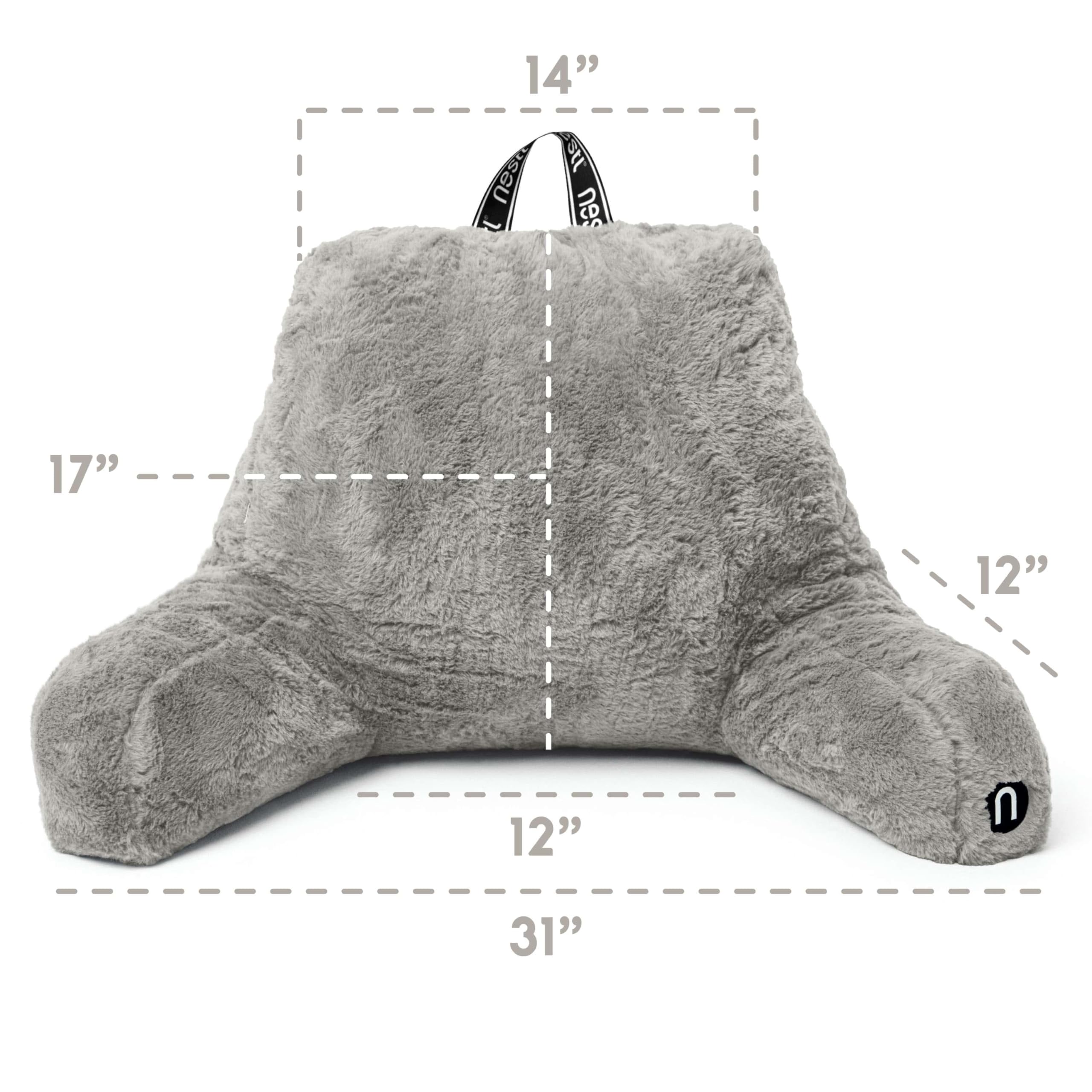 Nestl coussin utilisé au lit par une personne lisant, soutien dorsal amélioré