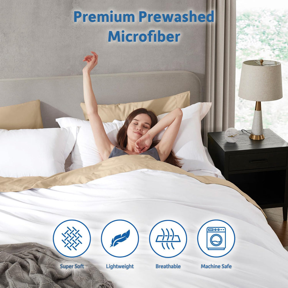 Nestl housse installée sur un lit queen illustrant ajustement parfait