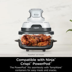 Ninja récipient cuisant un poulet entier avec légumes pour repas familial
