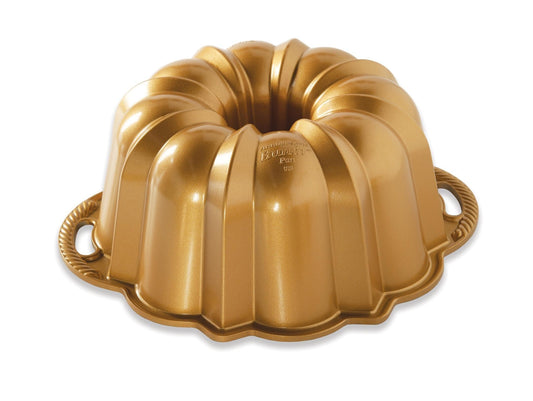 Nordic Ware moule Anniversary Bundt face montrant finition dorée et démoulage facile