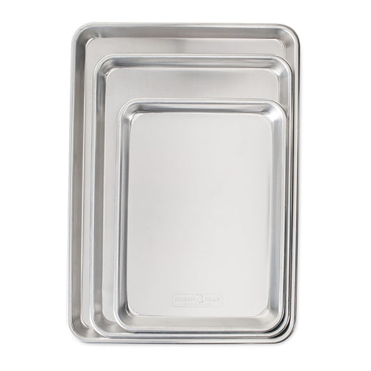 Nordic Ware plaque ensemble face montrant finition aluminium et robustesse