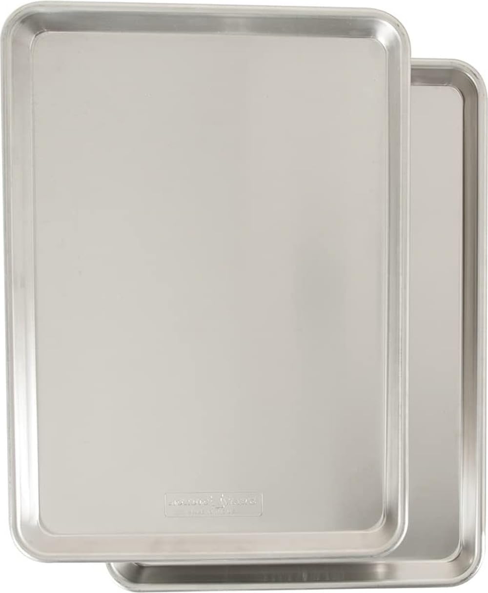 Nordic Ware face avant montrant la plaque demi-feuille et emballage, robustesse visible