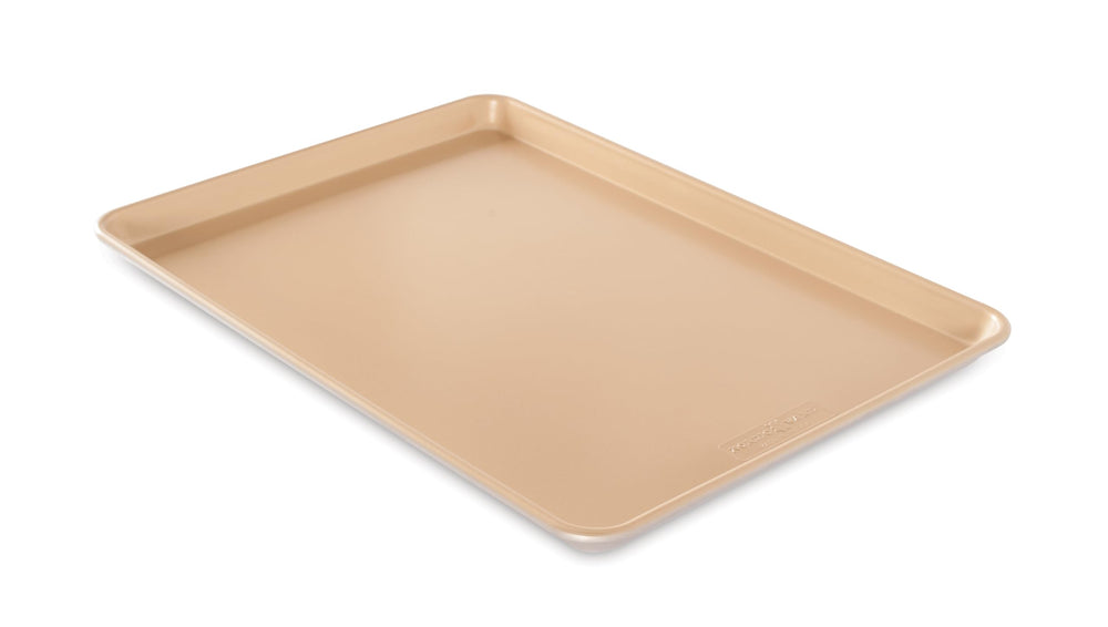 Nordic Ware plaque face avant montrant la grande surface utile et cuisson uniforme