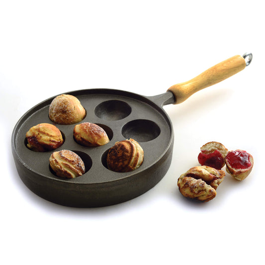 Norpro poêle aebleskiver face montrant les 7 alvéoles pour portions régulières