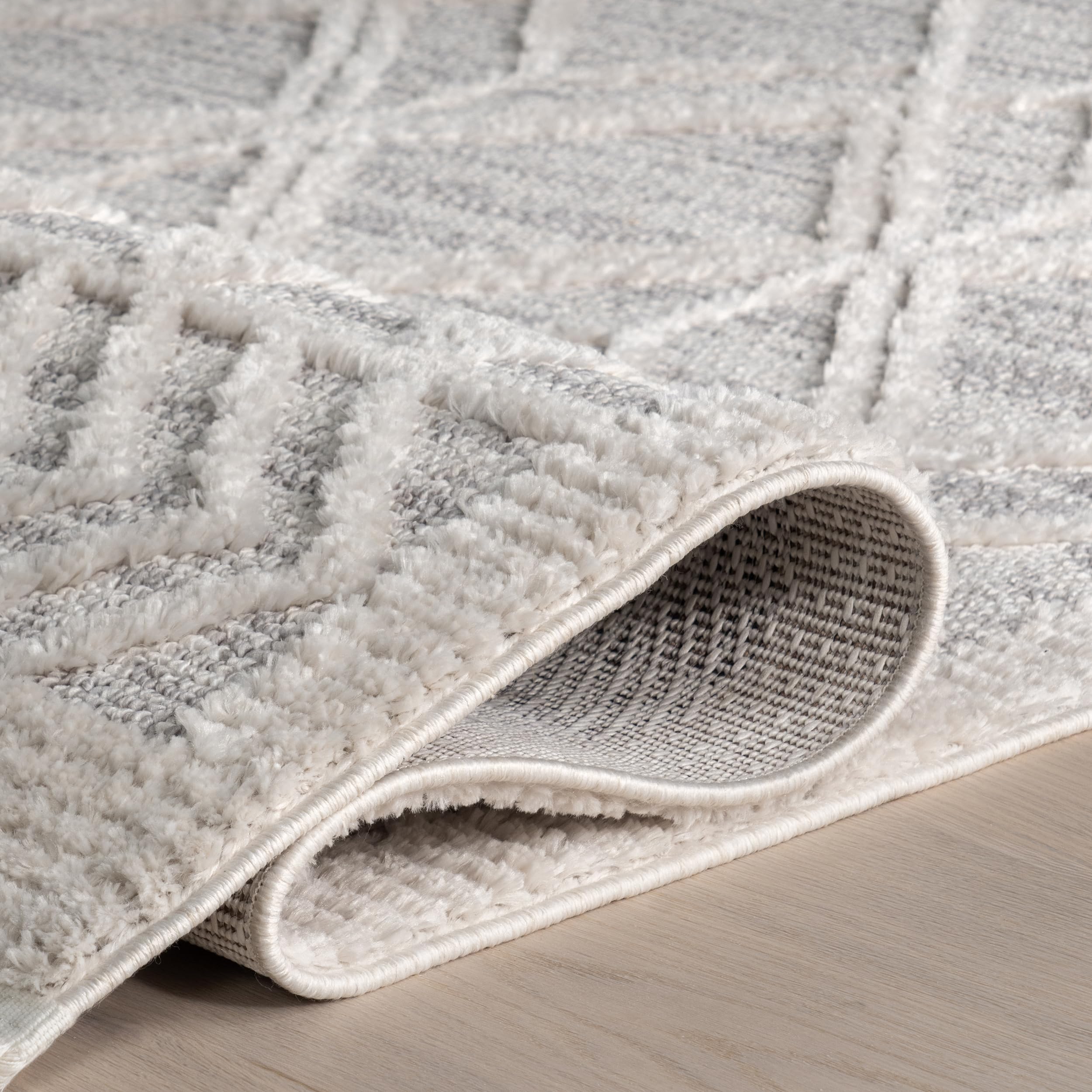 nuLOOM Ansley gros plan sur les tassels offrant relief décoratif