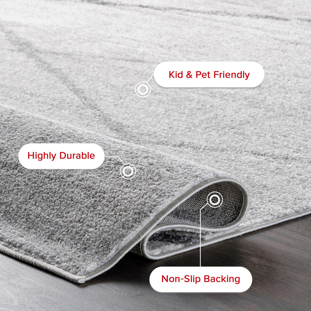 nuLOOM Thigpen à côté d'une chaise pour montrer l'échelle pratique