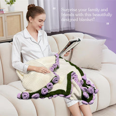 ofrence plaid déployé sur canapé apportant chaleur et design floral