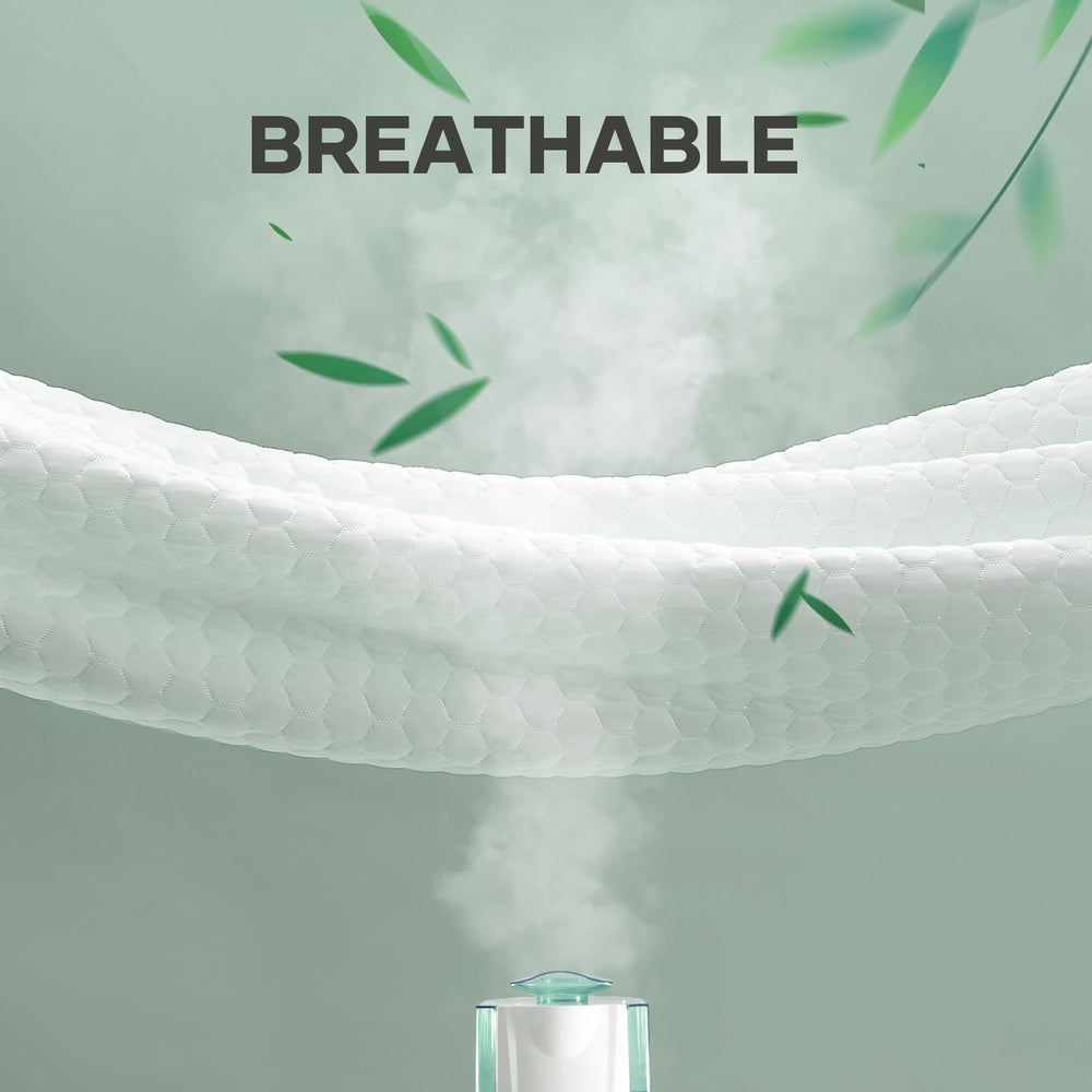 OhGeni protège-matelas dans machine illustrant lavage facile et durable