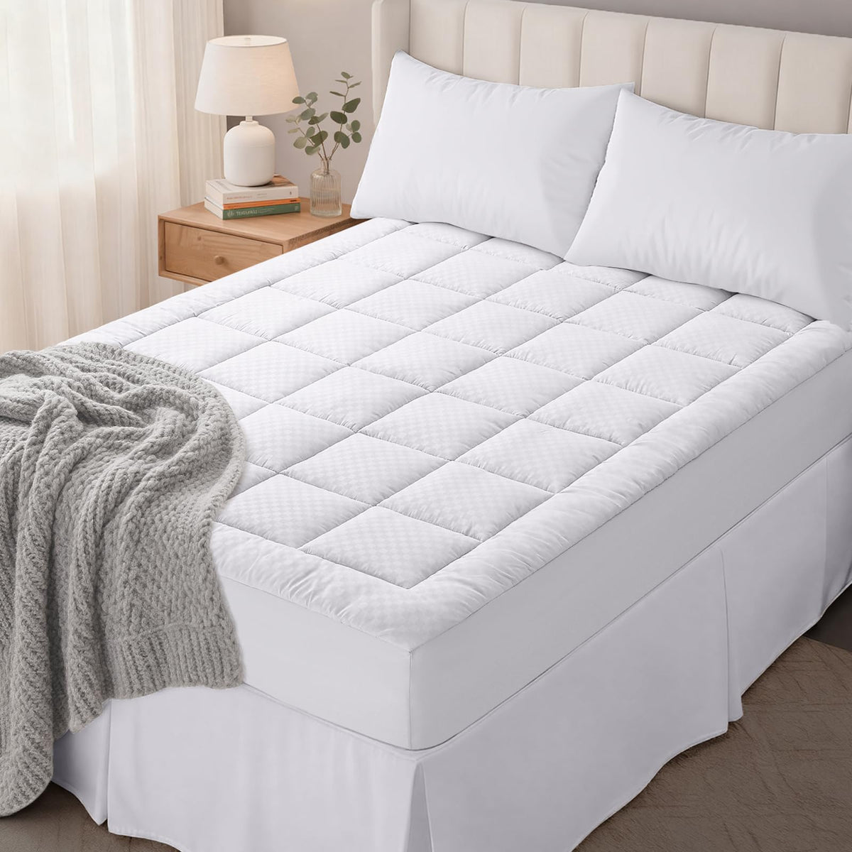 OLANLY vue avant du surmatelas avec packaging sécurité et confort