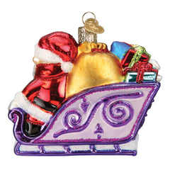 Old World Christmas gros plan peinture, détails précis et paillettes
