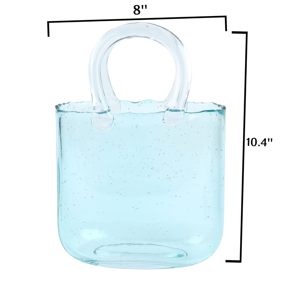 OLEEK vase gros plan texture verre bleu mettant en valeur brillance