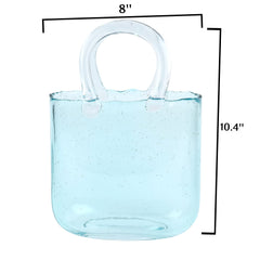 OLEEK vase gros plan texture verre bleu mettant en valeur brillance