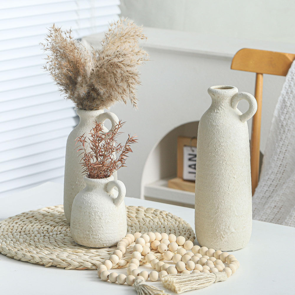 ooit vase avec fleurs séchées illustrant usage décoratif durable sans entretien