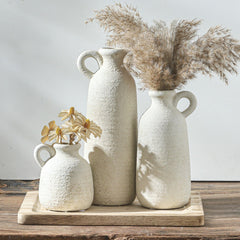 ooit ensemble face avant montrant trois vases blancs patinés pour décoration chaleureuse
