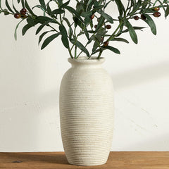 ooit vase face avant montrant silhouette rustique et effet chaleureux
