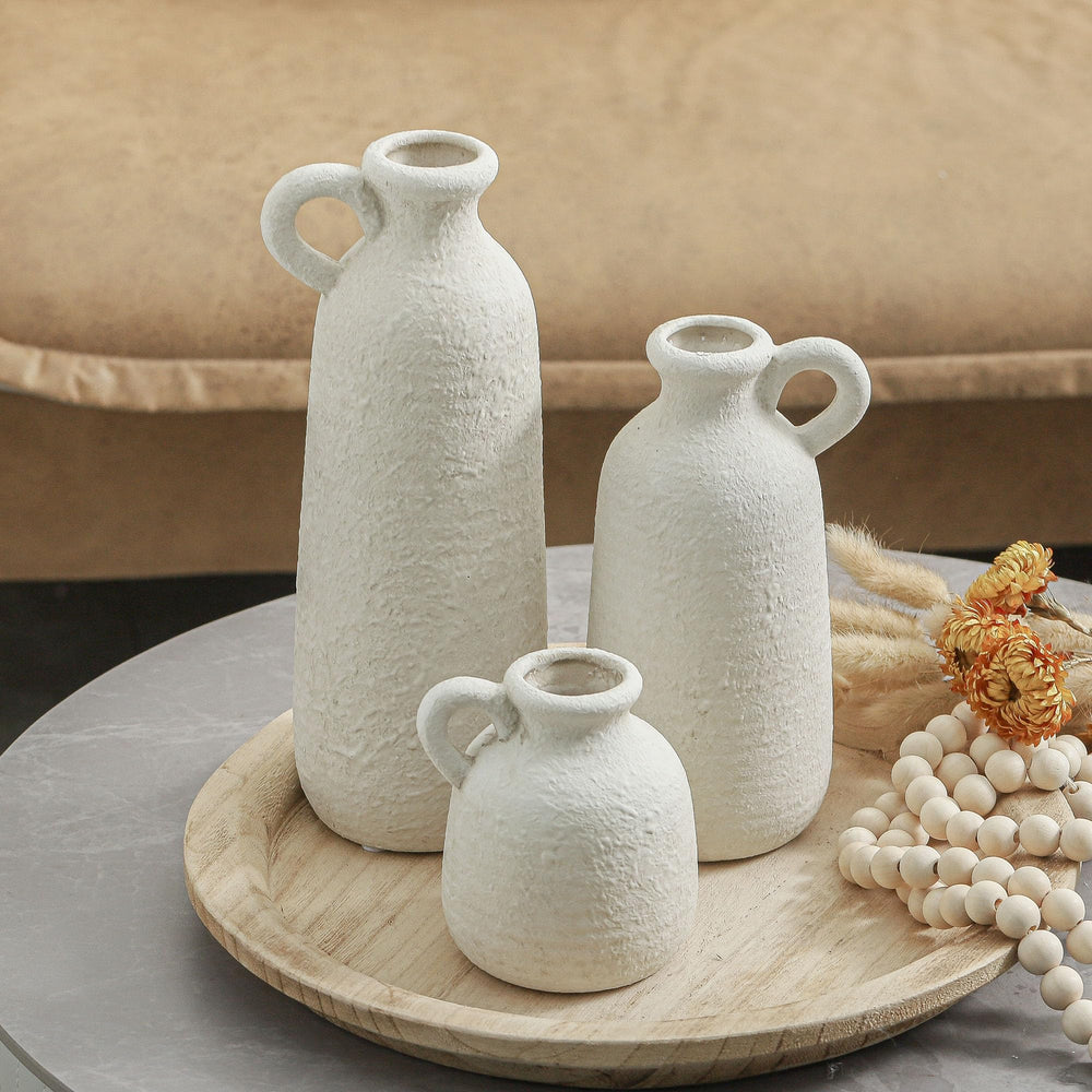 ooit scène de vie salon montrant vases intégrés à une décoration d'intérieur accueillante