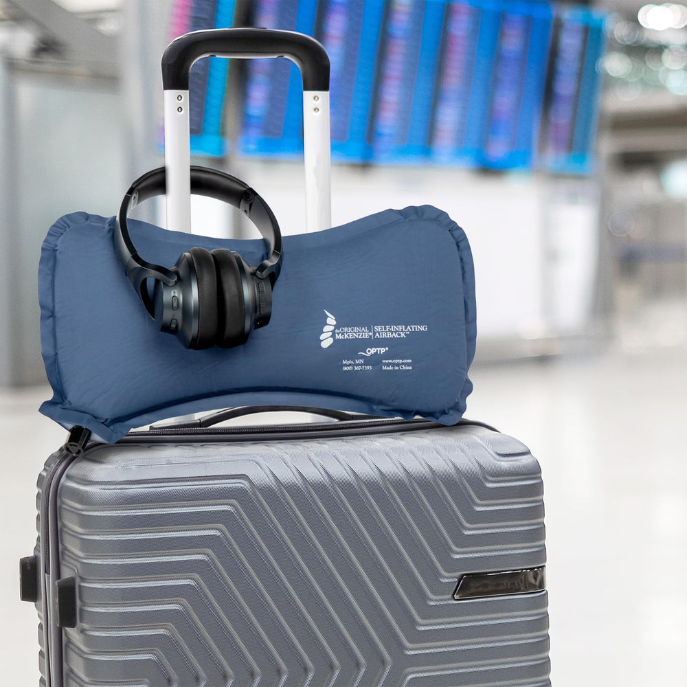 OPTP AirBack plié dans une valise à main pour gain de place en voyage