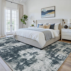 Oriannal tapis 8x10 posé dans un salon apportant chaleur visuelle