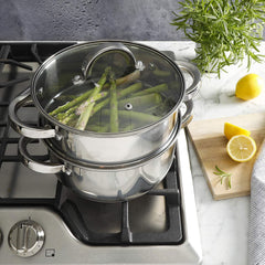 Cocotte Oster Sangerfield en usage sur plaque avec légumes vapeur sains