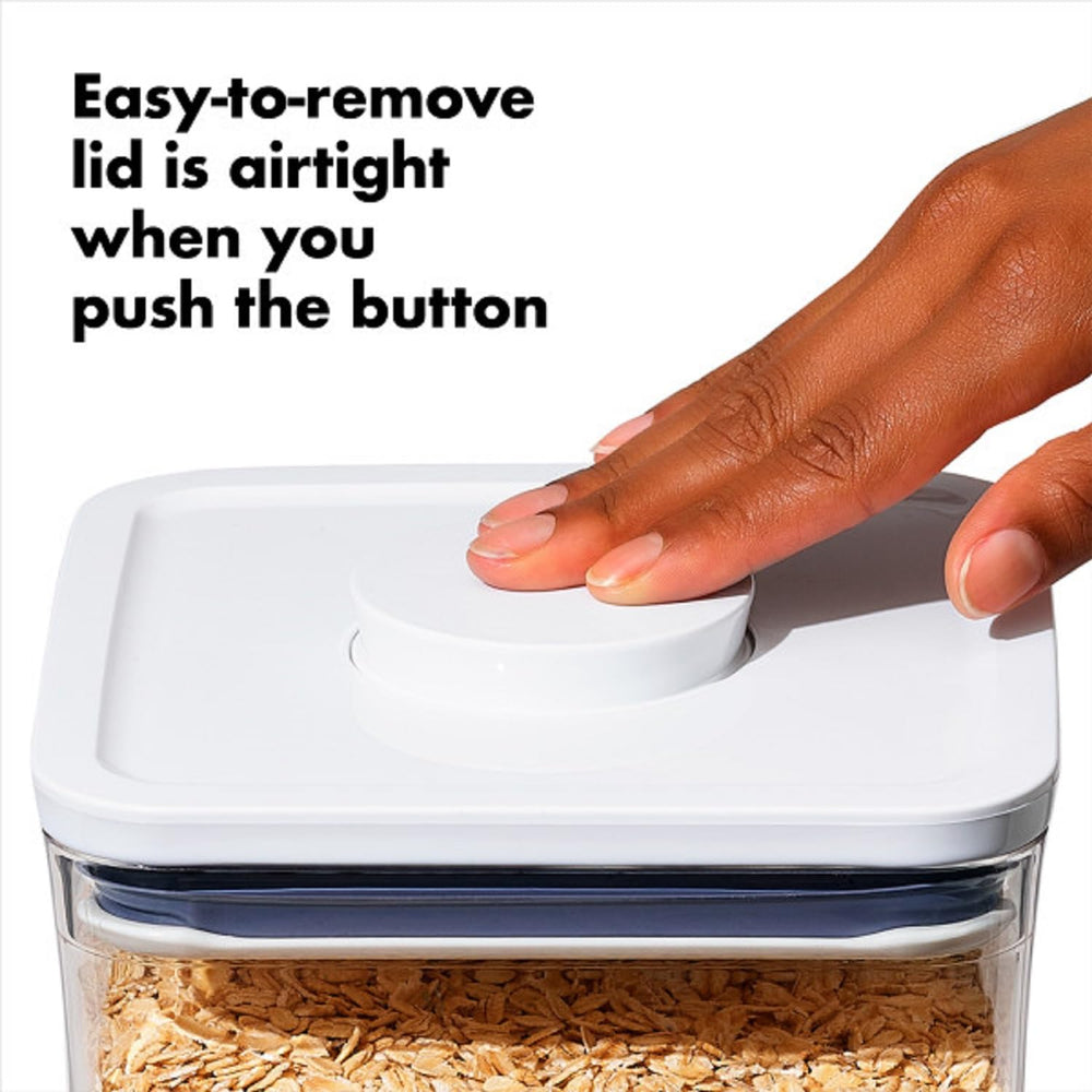 OXO cuillère rangée sous couvercle dose précise et rangement pratique
