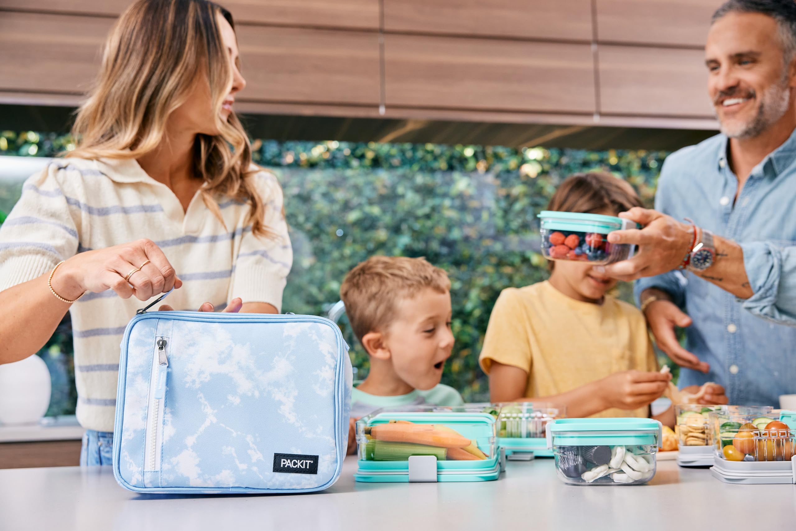 PackIt Freezable Classic Blue Sky gros plan poignée et boucle pour transport sécurisé
