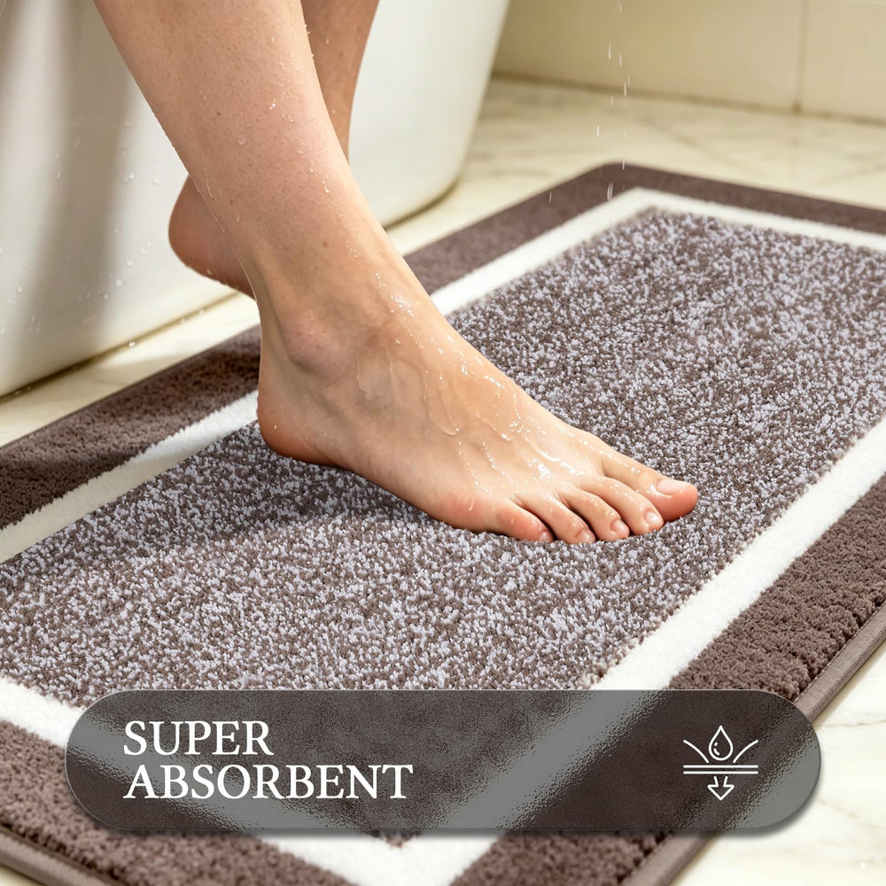 Pauwer tapis posé devant baignoire illustrant usage et protection au sol