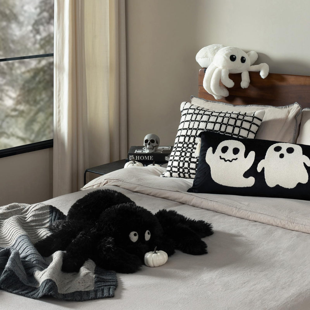 Phantoscope coussin dans décor Halloween créant atmosphère ludique et accueillante