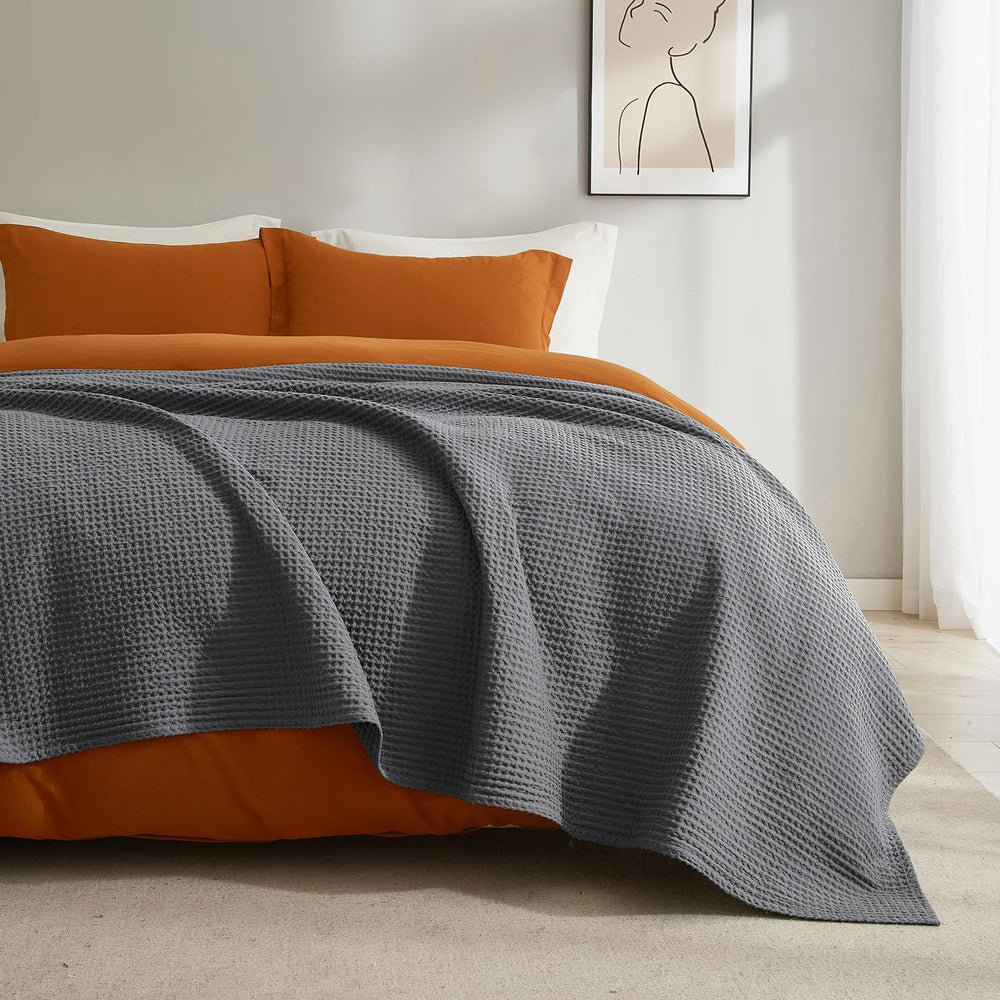PHF plaid intégré dans un décor de chambre moderne et accueillant
