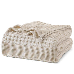 PHF plaid gaufré sur lit king taupe apportant confort et style