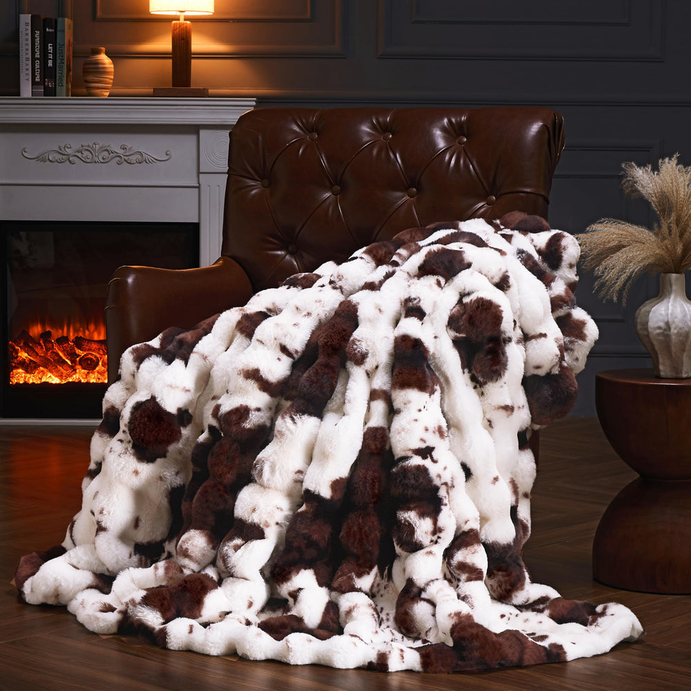PLUUSHUU face avant montrant le plaid et son emballage cadeau pratique
