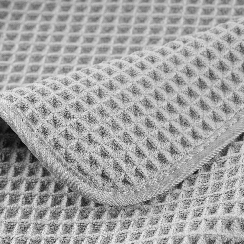 POLYTE texture gros plan des fibres microfibre soulignant douceur et séchage rapide