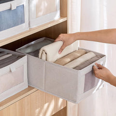 Pradnel boîte en usage dans placard facilitant accès et tri
