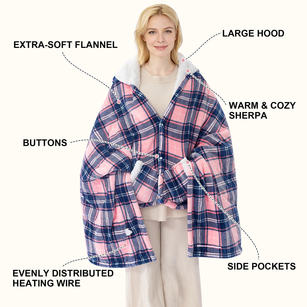 PTQ poncho posé sur un canapé créant une ambiance cosy