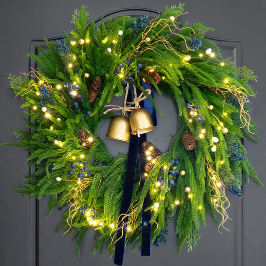 PureCosy couronne 24" sur porte montrant accueil festif
