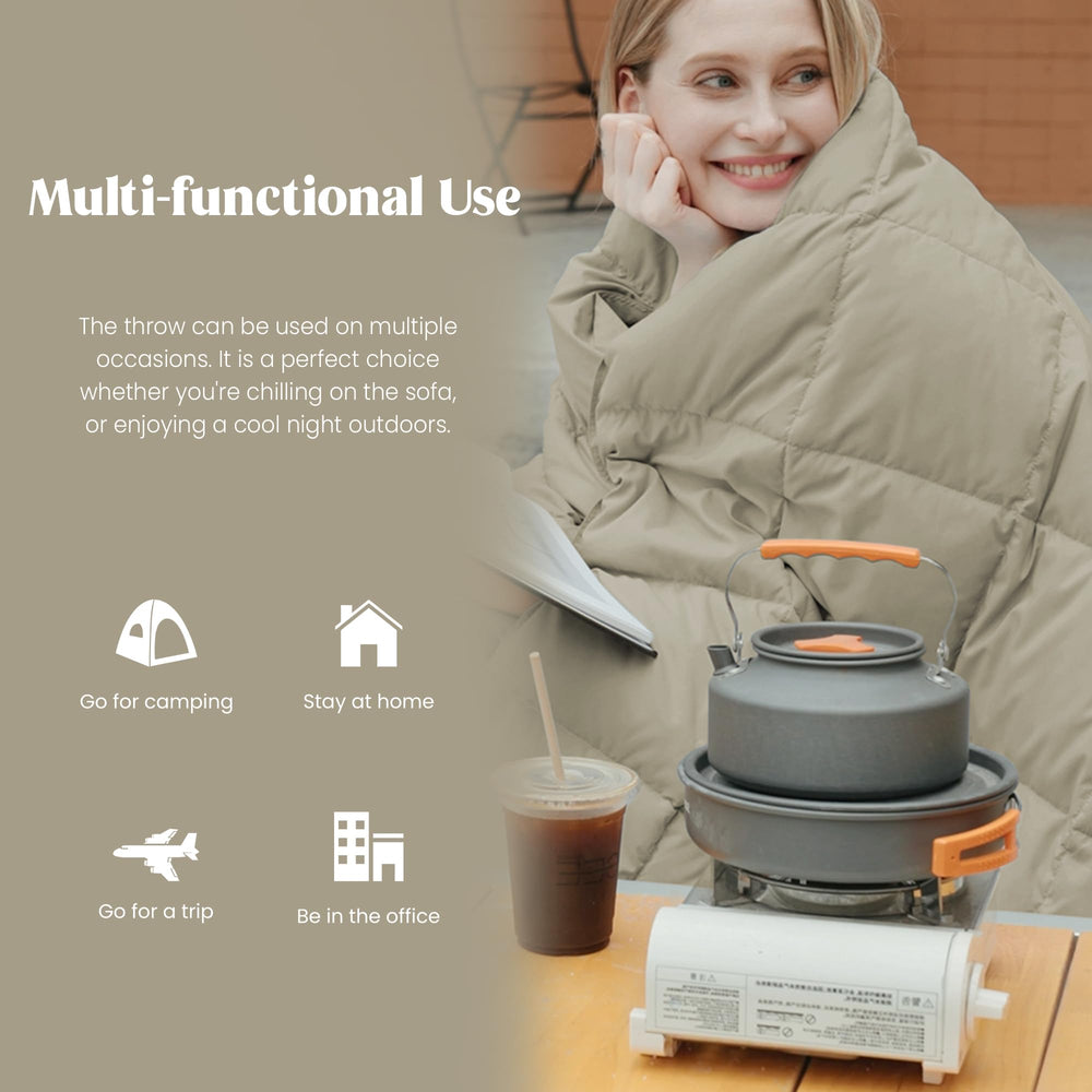 puredown plaid utilisé sur canapé offrant chaleur légère