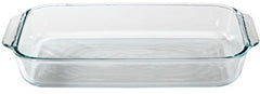 Pyrex plat oblong en usage dans un four avec gratin, illustrant cuisson uniforme