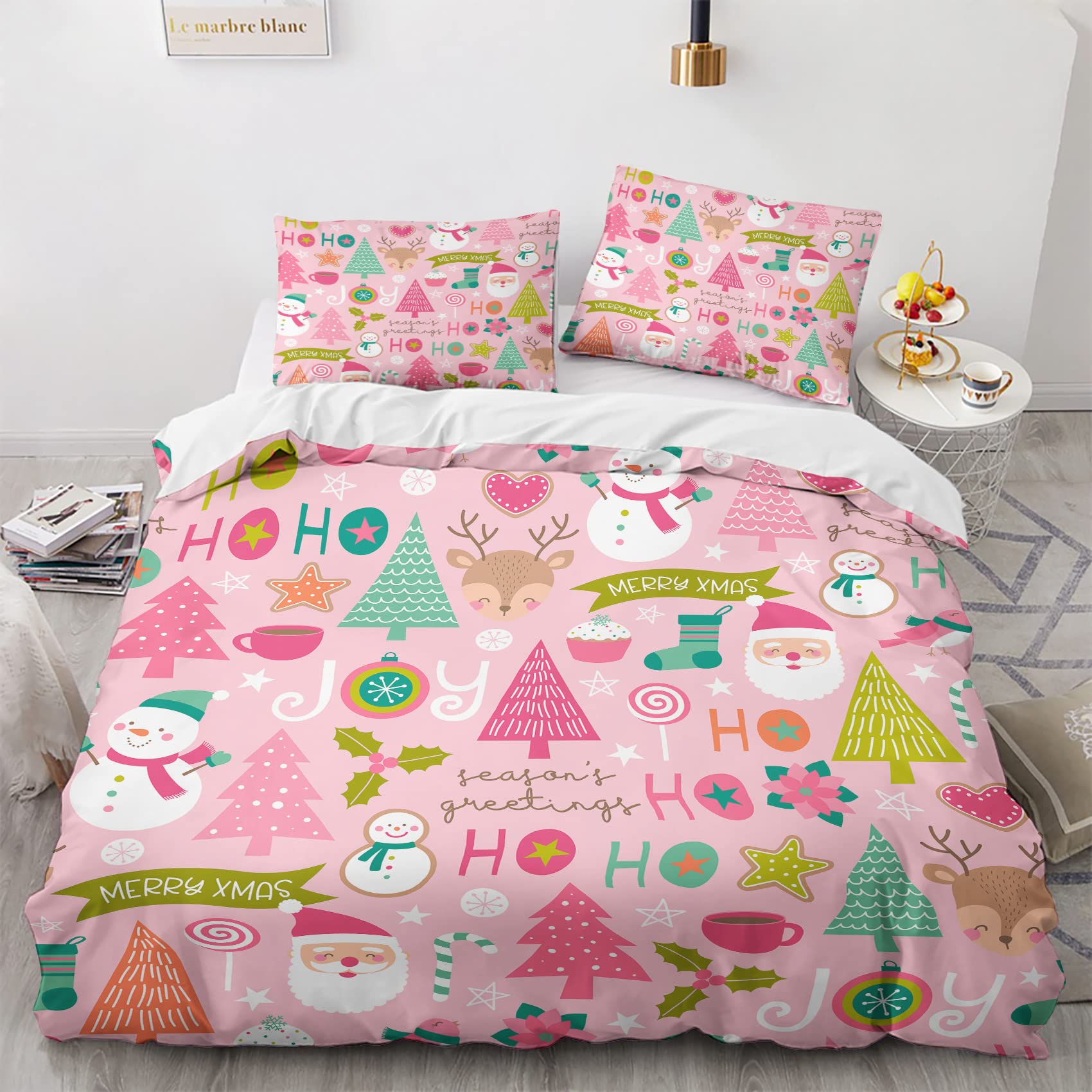QEODAH face avant du packaging montrant la housse rose et la taie, décor festif