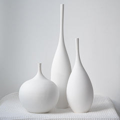 Relexome ensemble face montrant trois vases blancs pour décoration élégante