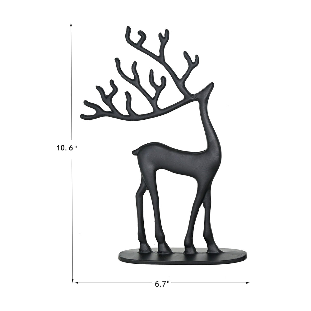 Remenna statue à l'échelle posée près d'un livre pour indiquer taille réelle