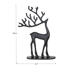 Remenna statue à l'échelle posée près d'un livre pour indiquer taille réelle